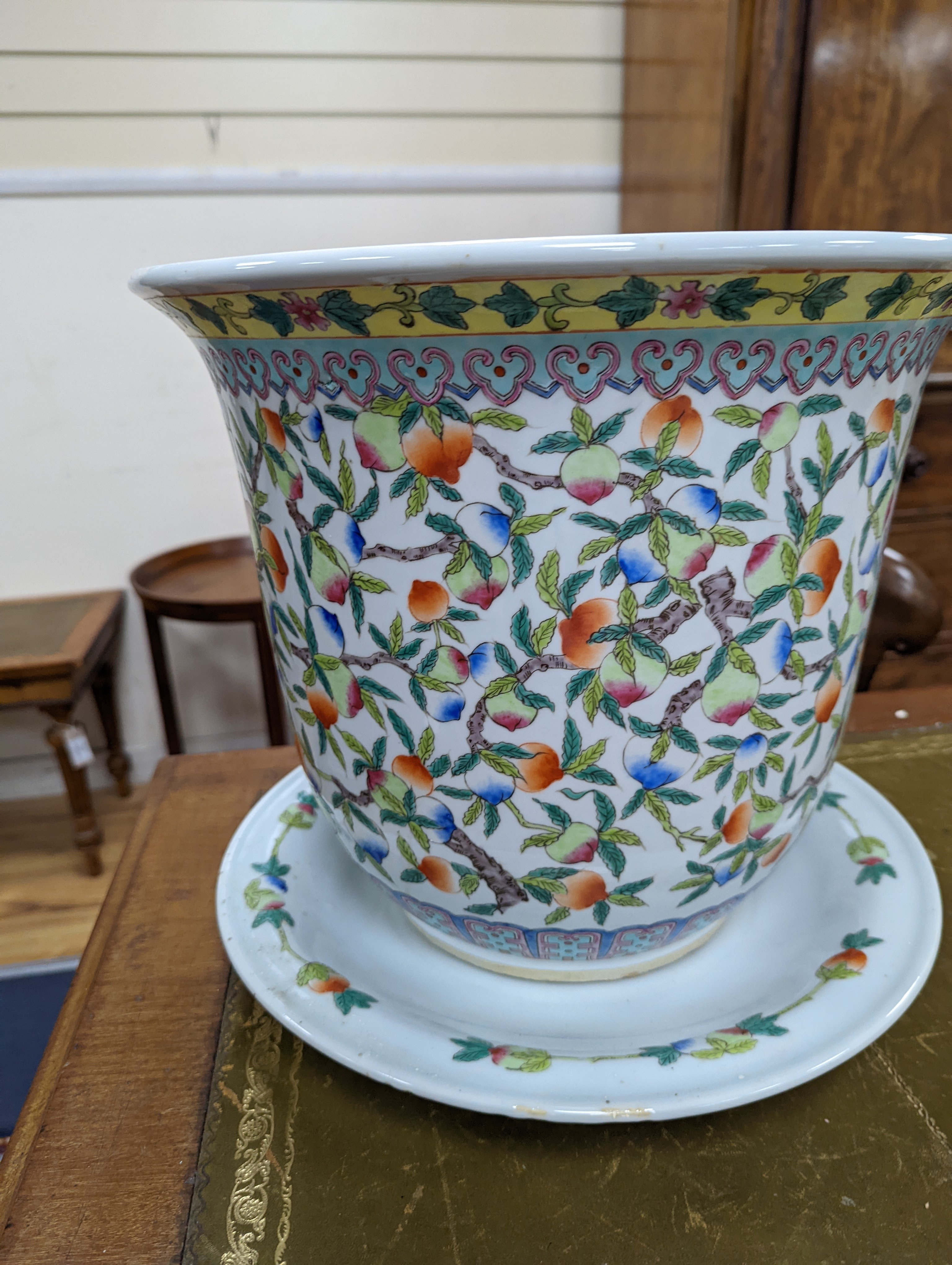 A 20th century Chinese porcelain jardiniere and dish, diameter 36 cms.